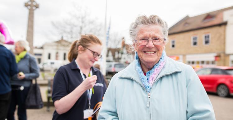 volunteers - one older woman, one younger woman